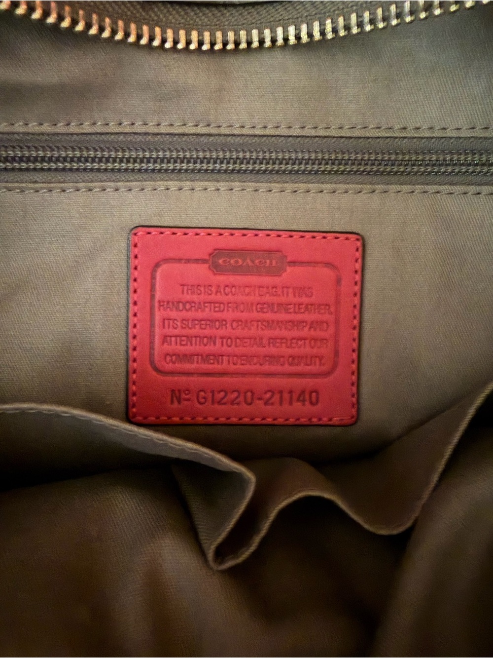 Coach Leather Bag with pink Interior Patch and tassel